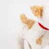 Close-up of a stuffed toy dog's tail and ear. Anteprima dell’immagine prodotto