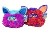 Two Furby toys are displayed side-by-side against a white background. Voir les images du produit