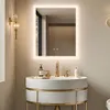 A bathroom vanity with a mirror and sink. Anteprima dell’immagine prodotto