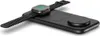 A black wireless charging pad with a smartwatch and a phone accessory on it, set against a white background. Voir les images du produit