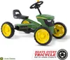 A green and yellow pedal tractor toy on a white background. Podgląd zdjęcia produktu