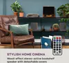 A living room scene with a leather armchair, bookshelf, and speakers. Produktbild-Vorschau