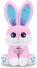 A pink plush bunny toy with large blue eyes and glittery ears sits facing the camera. Podgląd zdjęcia produktu