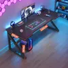 A gaming desk setup with a computer, monitor, keyboard, and headphones, illuminated by colorful LED lights. Náhled obrázku produktu