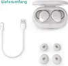 A product shot of white wireless earbuds and accessories on a white background. Produktbild-Vorschau