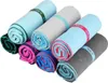Several rolled-up microfiber towels are arranged diagonally on a white background. Anteprima dell’immagine prodotto