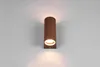A single brown cylindrical wall light is mounted on a white wall, emitting light upwards and downwards. Voir les images du produit