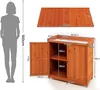 A diagram showing the dimensions of a wooden garden cabinet, with a silhouette of a person for scale. Náhled obrázku produktu