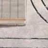 A close-up view of a rug, showing its texture and backing. Produktbild-Vorschau