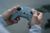 Hands holding a drone remote control. Voir les images du produit