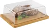 A clear plastic dome covers sausages and herbs on a bamboo cutting board. Produktbild-Vorschau
