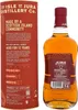A bottle of Jura 12 Year Old Single Malt Scotch Whisky next to its cylindrical gift packaging. Produktbild-Vorschau