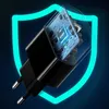 A close-up view of a black power adapter with its internal circuitry visible, superimposed on a glowing blue shield. Anteprima dell’immagine prodotto