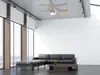 A modern living room with a large sectional sofa and a coffee table. Anteprima dell’immagine prodotto