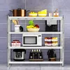 A multi-tiered metal shelf unit filled with various kitchen appliances and food items. Voir les images du produit