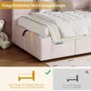 Close-up of a pink upholstered bed frame with a mattress, showing a storage pocket and a diagram illustrating a snap-in mattress design. Anteprima dell’immagine prodotto