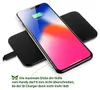 A smartphone is charging wirelessly on a black charging pad. Produktbild-Vorschau