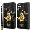 A black flip phone case with a gold butterfly design is shown open, displaying the inside card slots and the phone holder. The case is adorned with intricate gold butterfly and bead patterns against a textured black background. A matching wrist strap is at Produktbild-Vorschau