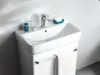 A clean and modern bathroom sink with a cabinet and a towel hanging from it. Podgląd zdjęcia produktu