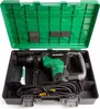 A power tool, specifically a hammer drill, is displayed inside its carrying case. Produktbild-Vorschau