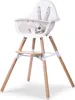 A white high chair with wooden legs is shown against a white background. Produktbild-Vorschau