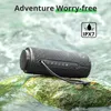 A black outdoor speaker is placed on a wet rock in a river, with water splashing around it. Náhľad obrázku produktu
