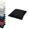 A stack of pillowcases in various colors, with a black pillowcase prominently displayed in the foreground. Produktbild-Vorschau