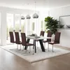 A dining room setting with a table and chairs. Produktbild-Vorschau