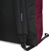 Close-up view of the back of a backpack, showing the strap and a brand tag. Náhľad obrázku produktu