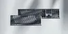 Two keyboards are shown on a light gray background with soft shadows. Produktbild-Vorschau