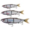Three fishing lures shaped like fish, arranged vertically against a white background. Náhled obrázku produktu