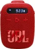 A red JBL portable speaker with a digital display showing 'FM 92.3'. Voir les images du produit