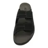 A top-down view of a black sandal. Anteprima dell’immagine prodotto