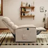 A beige recliner chair is shown in a living room setting with shelves and a lamp in the background. Anteprima dell’immagine prodotto