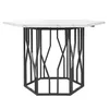 A hexagonal dining table with a marble-like top and a black geometric base, photographed against a white background. Náhled obrázku produktu