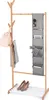 A wooden coat rack with a hanging bag, scarf, organizer, and shoes on a shelf. Produktbild-Vorschau