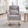 A gray rocking chair with wooden legs is placed on a gray rug in a room with a window in the background. Podgląd zdjęcia produktu