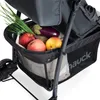 A close-up view of the storage basket of a stroller filled with fruits and vegetables. Anteprima dell’immagine prodotto