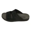 A side view of a black sandal on a white background. Anteprima dell’immagine prodotto