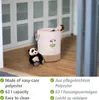 A pink laundry basket with a giraffe design and a panda toy next to it, placed on a wooden floor in front of a cabinet. Produktbild-Vorschau