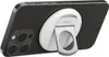 A black iPhone with a white Belkin MagSafe accessory attached to its back, shown in a horizontal orientation. Produktbild-Vorschau