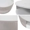 Collage of four close-up shots of a modern coffee table with a marble-patterned top and a slatted metal base. Produktbild-Vorschau