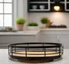 A rotating tray organizer is shown in a kitchen setting. Anteprima dell’immagine prodotto