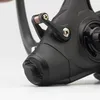 A close-up view of a fishing reel. Podgląd zdjęcia produktu