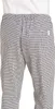 A close-up view of the lower half of a person wearing black and white checkered chef pants. Produktbild-Vorschau