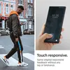 A split image showing a man walking on a street and a hand holding a smartphone with a screen protector. Podgląd zdjęcia produktu