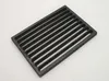 A dark gray grate with parallel slats on a white background. Produktbild-Vorschau
