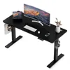 A black adjustable standing desk with a curved monitor, keyboard, tablet, and other accessories. Produktbild-Vorschau