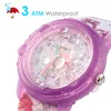Close-up of a child's watch with water droplets on the face, highlighting its waterproof feature. Produktbild-Vorschau