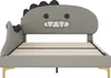 Front view of a children's bed with a dinosaur-themed headboard. Produktbild-Vorschau